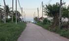ผืนดินไทยทรงคุณค่า  ที่ดินติดถนนหลวง ใกล้หาดบางเบิด  ไร่ล่ะ 8 แสน