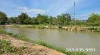 ขายที่สวยติดถนนเลียบคลอง ใกล้ สี่แยกจปร. ต.พรหมณี อ.เมืองนครนายก